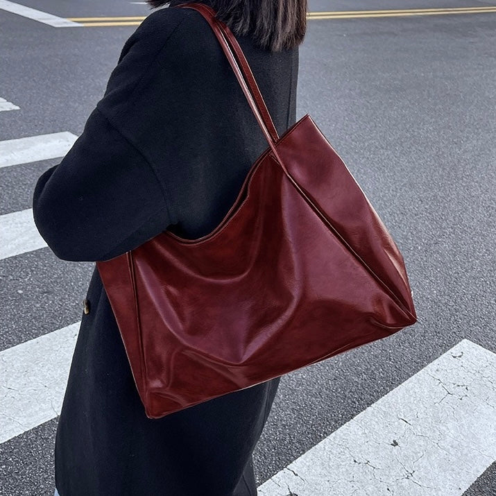 Patricia™ | Glänzende Lederhandtasche
